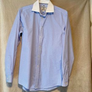 JS. Bank long sleeves buttons down shirt in perfect condition
